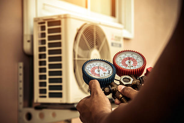 Professional Hvac technician working in Mustang, OK